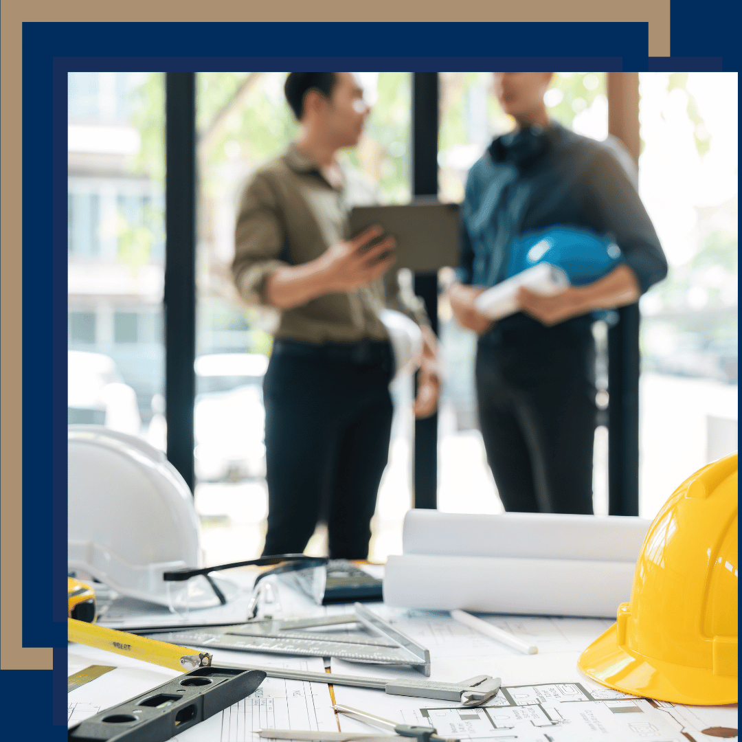 3 Integrated Renovations Team Members Looking Over Plans